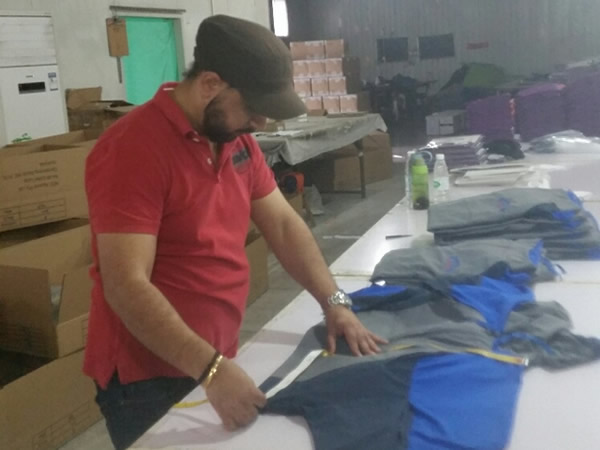 Client Inspecting Garments